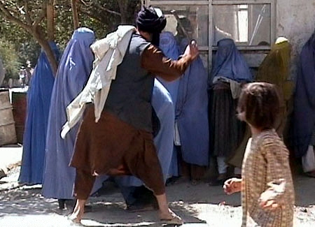 Taliban_beating_woman_in_public_RAWA